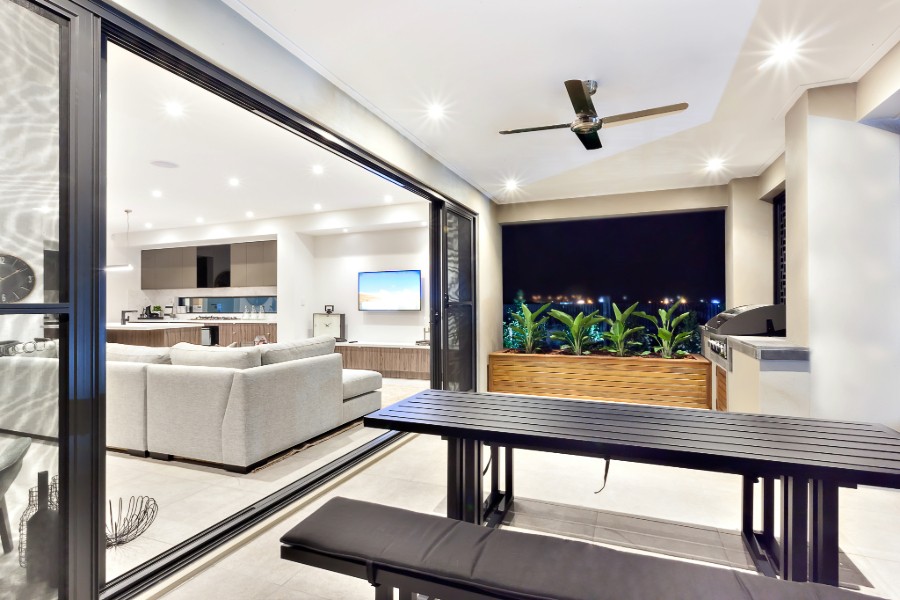 A modern living room with sleek sliding glass doors.