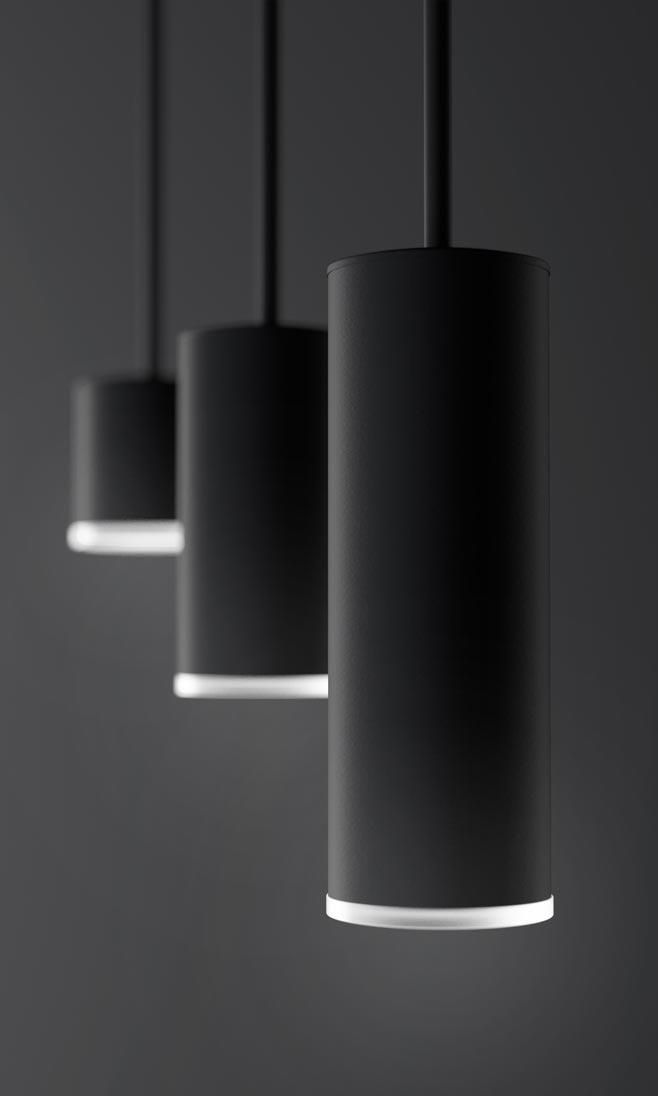 Elegant black DMF Lighting pendant lights hanging in a row, creating a sophisticated ambiance.